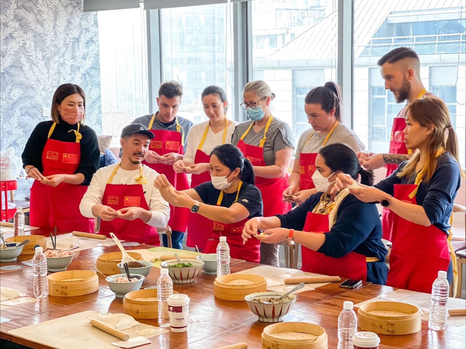 Cici teaching guests in her Shanghai kitchen