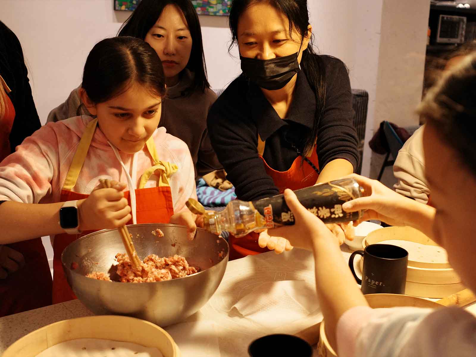 Travelers sharing the table during Shanghai Soup Dumpling Making Experience